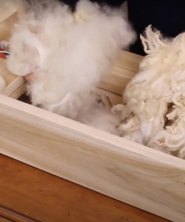 Escarmenadora de Lana